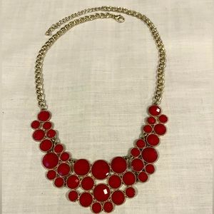Vintage bib necklace with octagon cut gorgeous red “stones”.